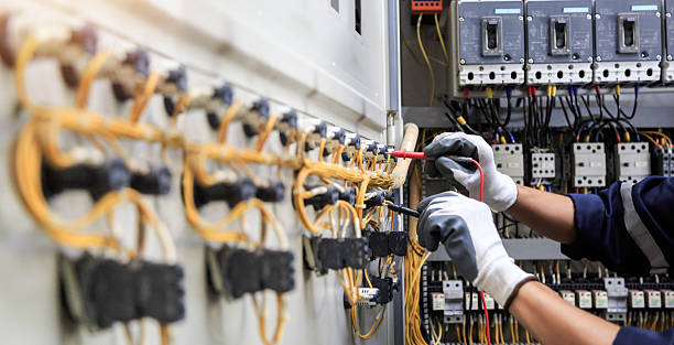 Professional Generator Installation technician working in North Fort Lewis, WA